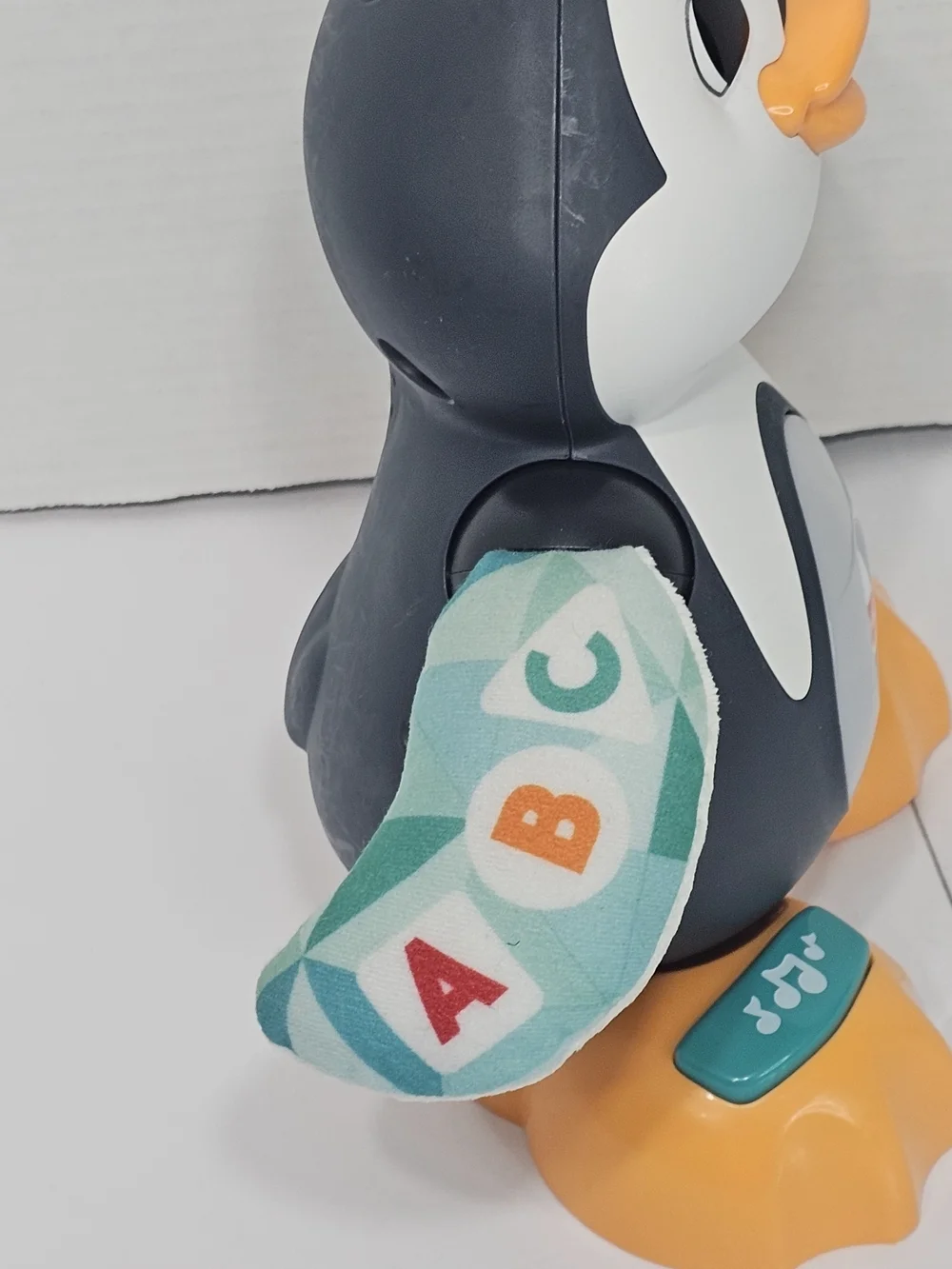 Fisher-Price Gray & Orange Penguin Interactive Kids Toy